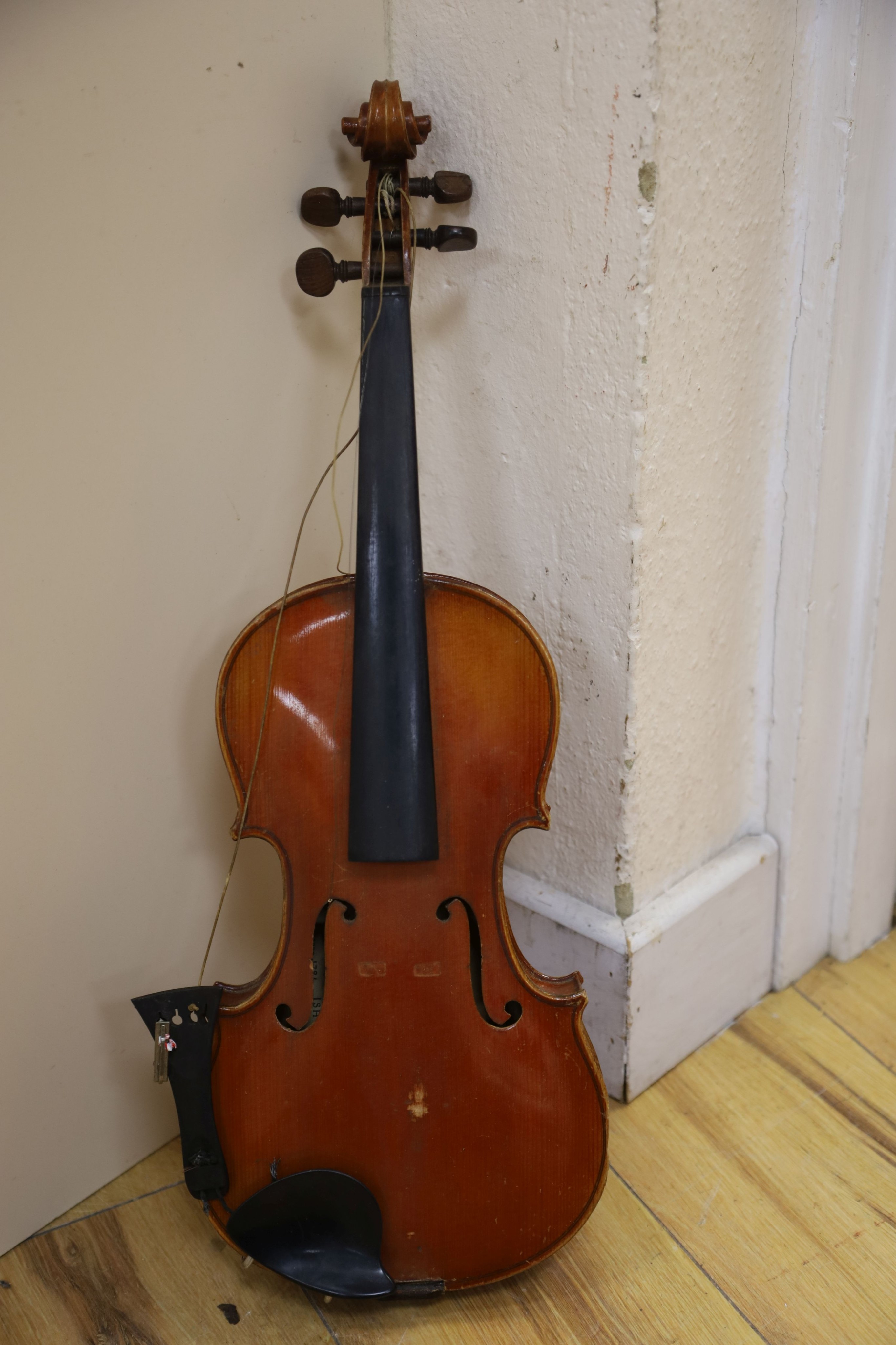 A Stradivarius copy violin and two bows and another bow, both cased, backs 33cm and 30cm